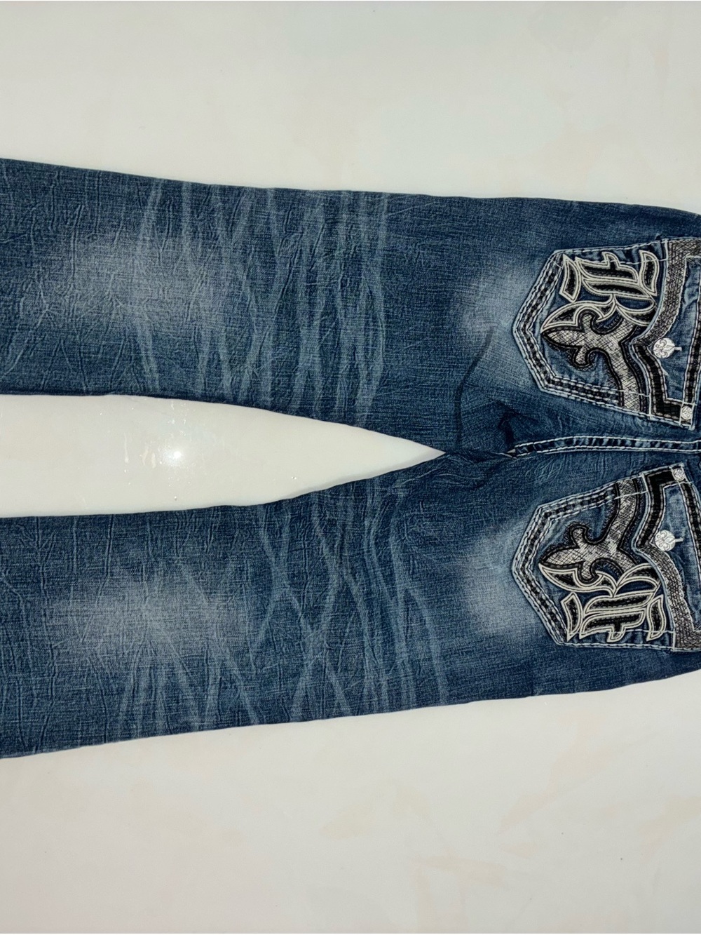 Rock Revival Slim Straight Distressed Blue Jeans with Embroidered Pockets